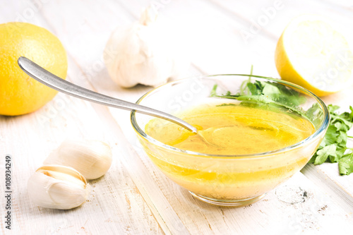 vinaigrette sauce in glass bowl