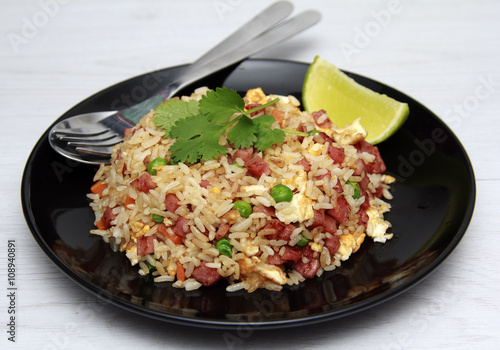 Dice Bacon Fried rice in black dish