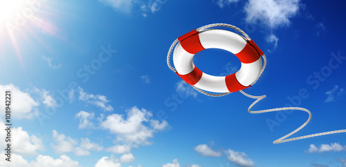 Throwing A Life Preserver In The Sky - Help Concept
 photo