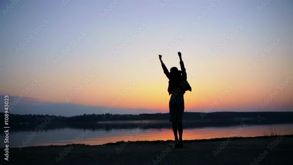 Happy Woman Jumping in Sea Sunset - slow motion Happy Woman Jumping in Sea Sunset - slow motion
