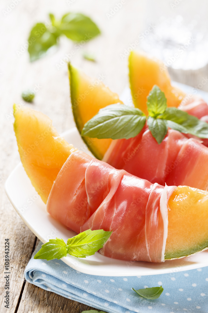 Melon with ham and basil