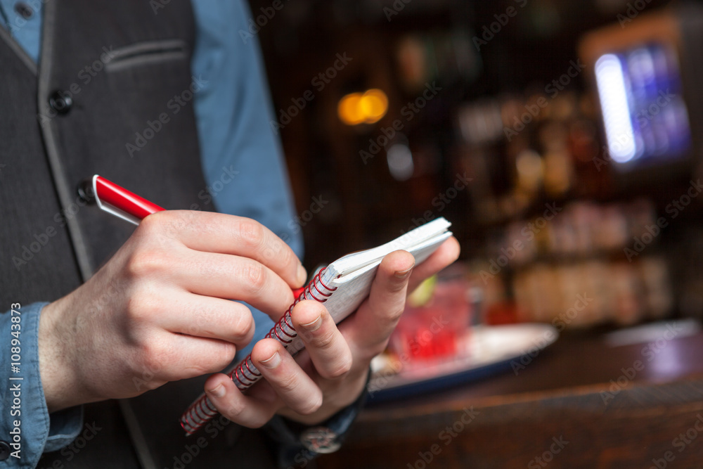 Obraz premium Waiter taking an order.