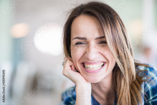 Portrait of cheerful woman