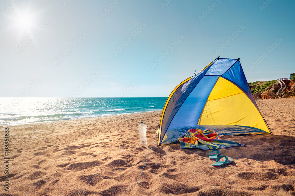 Beach scene with a beach tent