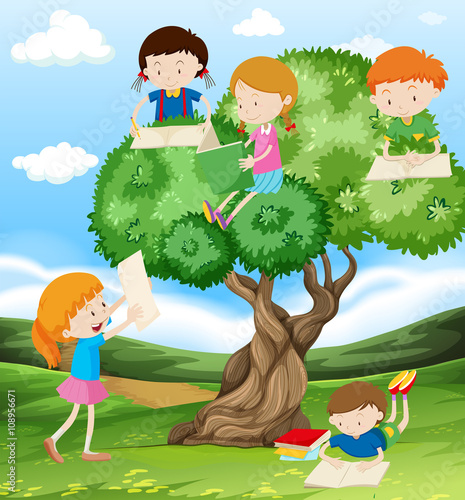 Children reading and writing in the park