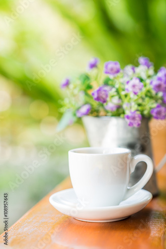 espresso coffee cup on wooden table ,soft focus