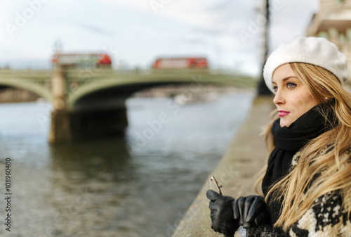 UK, London, young woman near Westminster Bridge photo