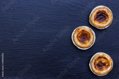 Egg tart on a grunge background