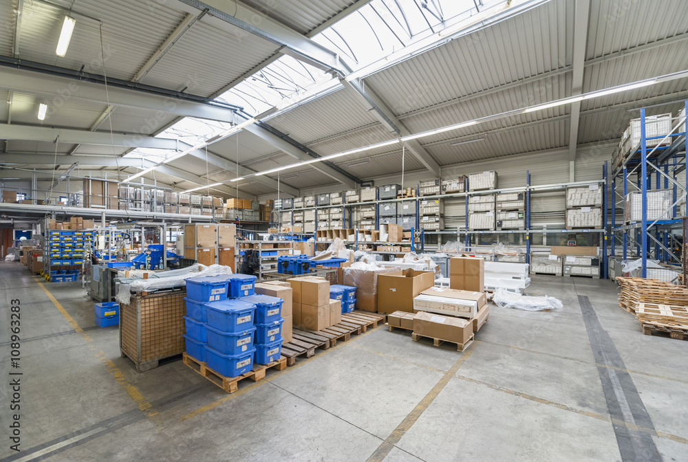Empty industrial hall with stored packages Empty industrial hall with stored packages
