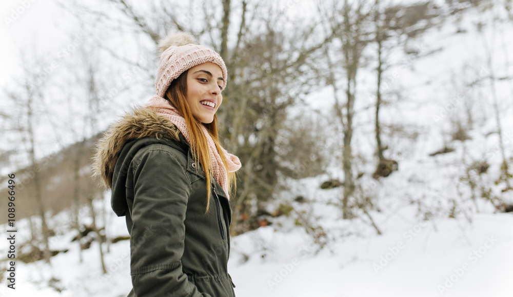 Spain, Asturias, happy young woman in the snowy mountains Spain, Asturias, happy young woman in the snowy mountains