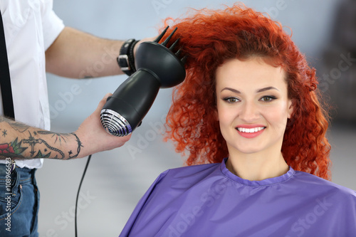 Beautiful girl visit hairdressing salon