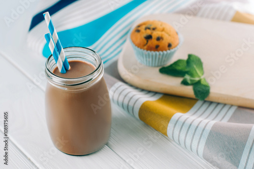 Close up of chocolate milk in glass bottle