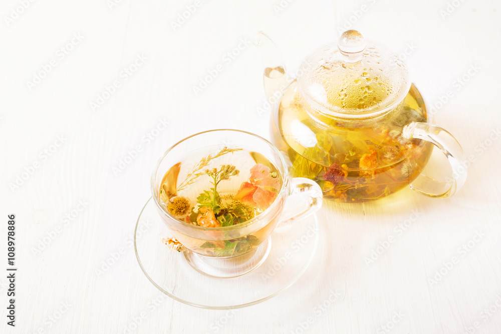 Teapot and cup with tea Teapot and cup with tea