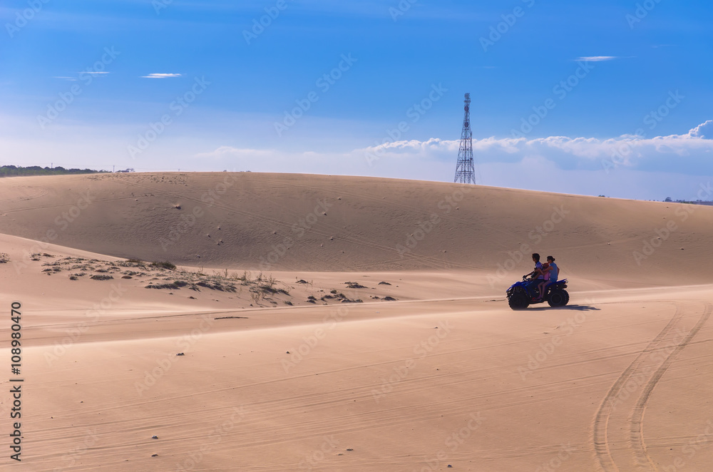 Landscape White sand dune with ATV Car in Mui Ne, Vietnam Popula Landscape White sand dune with ATV Car in Mui Ne, Vietnam Popula