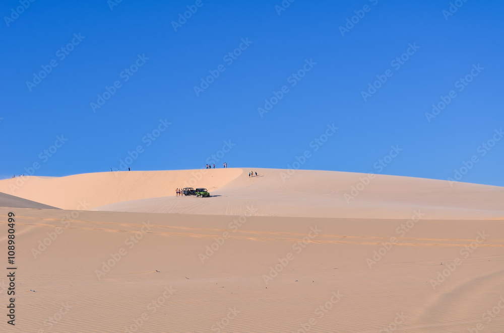 Landscape White sand dune with car tracks in Mui Ne, Vietnam Pop