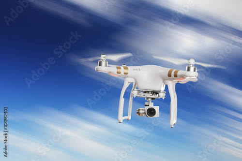 Drone with high resolution camera flying.