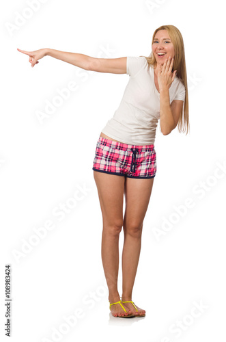 Young woman in pink plaid shorts isolated on white