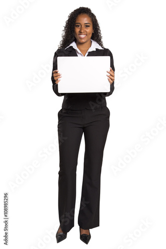 Happy African American business woman holding placard