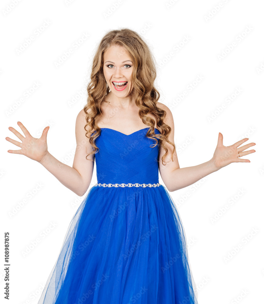 Studio shot young girl in elegant blue dress looking at the camera Studio shot young girl in elegant blue dress looking at the camera