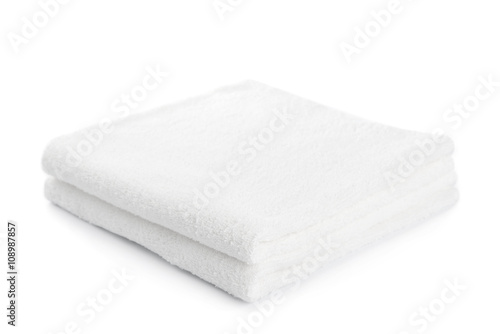 stack of white towels isolated photo