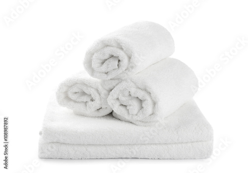 rolled up white beach towel