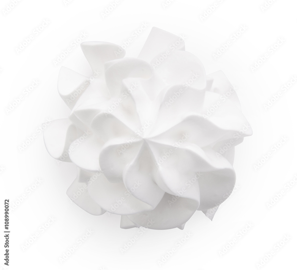 Frozen yogurt. Whipped cream isolated on a black background with clipping path. Top view.