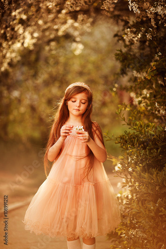 beautiful girl in the park in spring