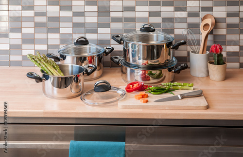 steel cookware set with modern kitchen photo