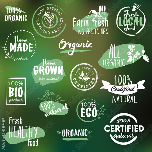 Hand drawn labels and badges collection for organic food and drink, natural products, restaurant, healthy food market and production, on the nature background. Vector illustrations.