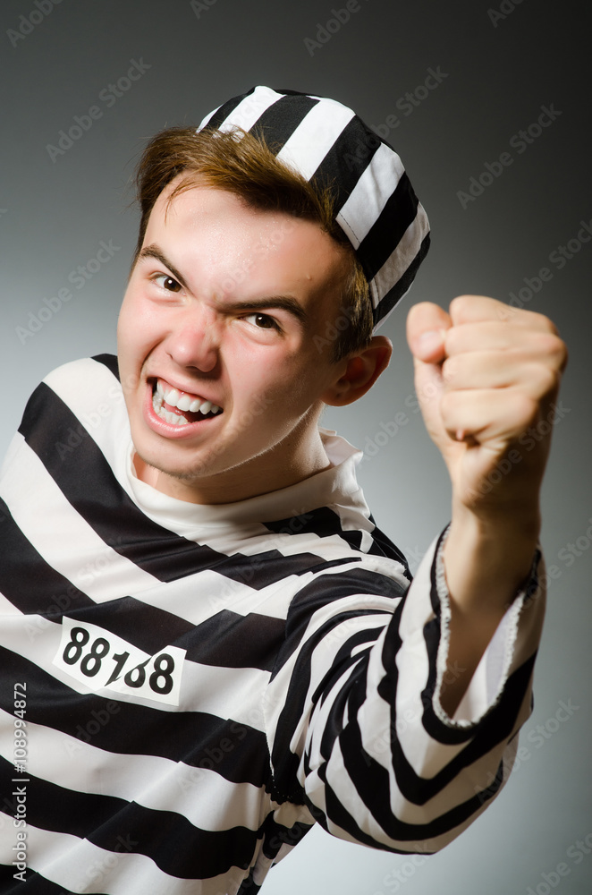 Funny prisoner in prison concept Funny prisoner in prison concept