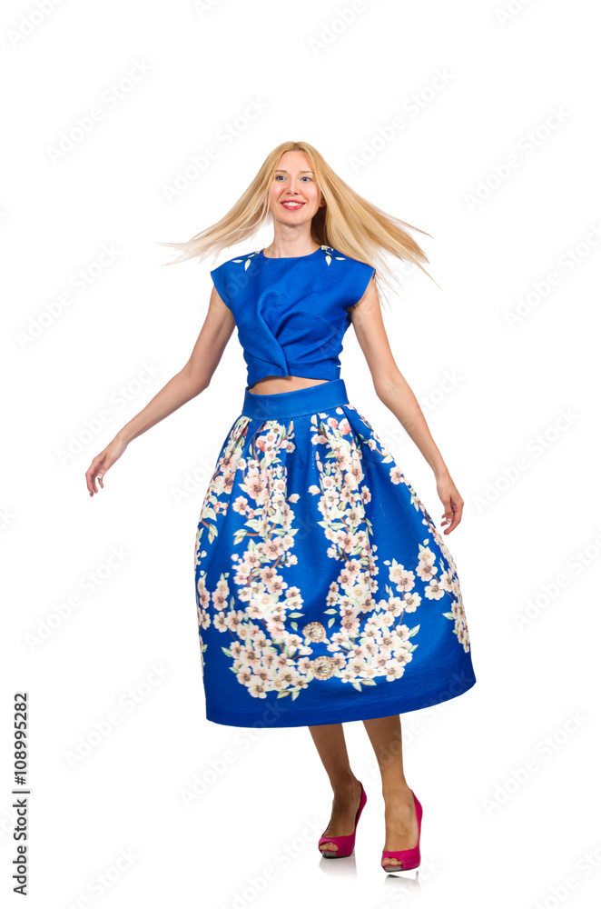 Woman in long blue folral dress isolated on white