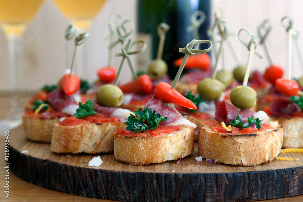 Tapas on Crusty Bread Selection of Spanish tapas Stock Photo Adobe