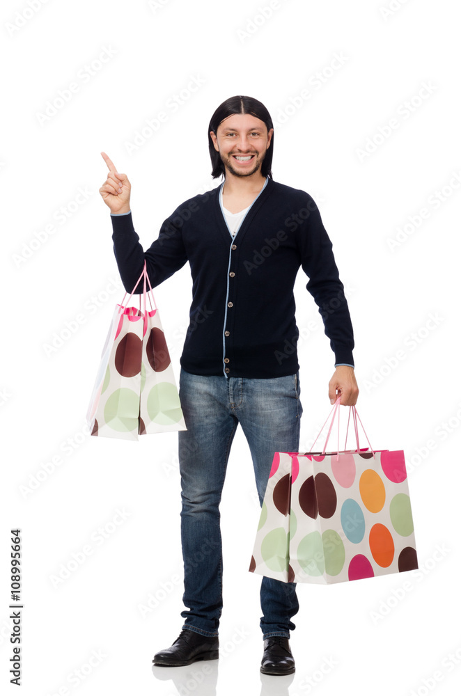 Young man holding plastic bags isolated on white