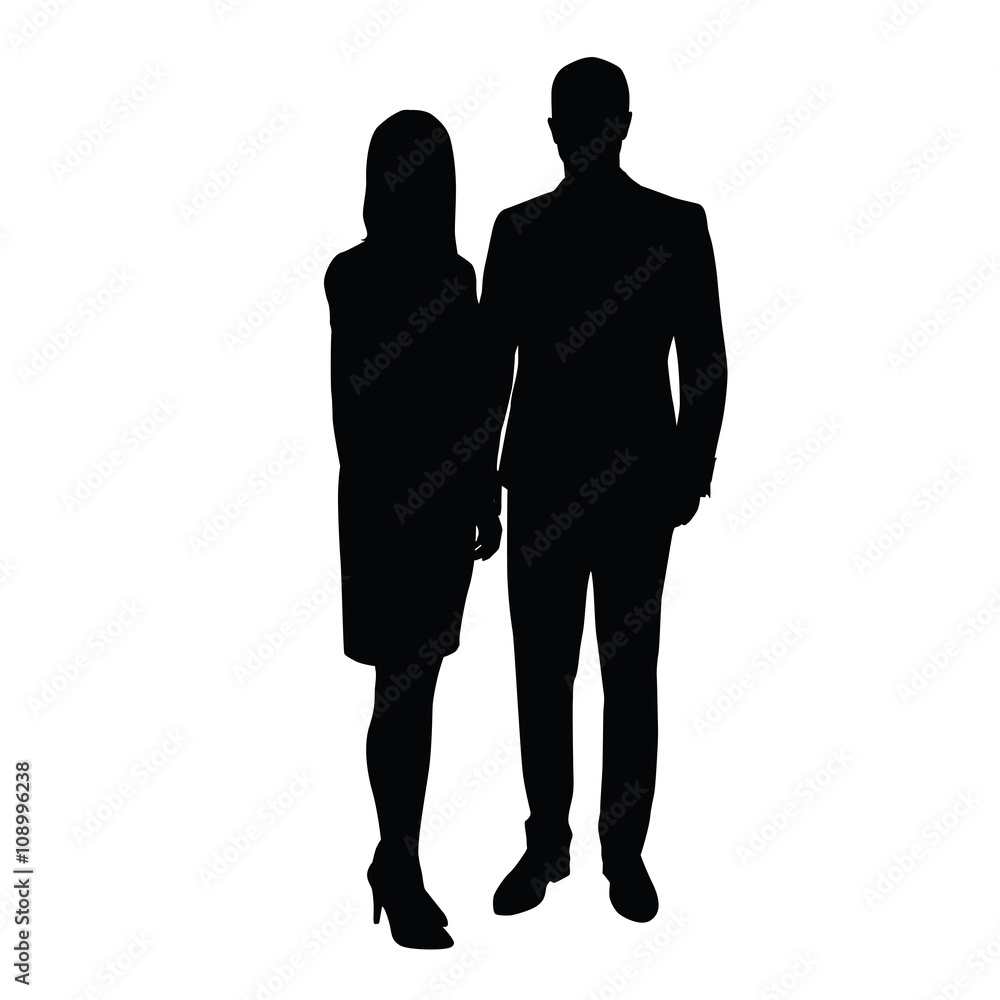 Man and woman in formal wear standing side by side. Man and woman in formal wear standing side by side.
