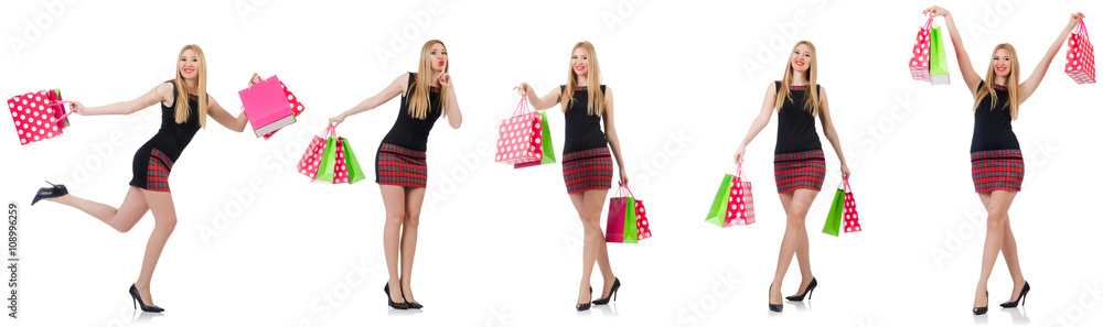 Woman with shopping bags isolated on white Woman with shopping bags isolated on white