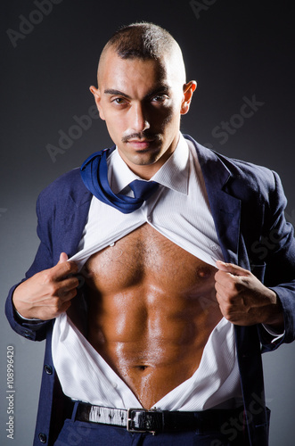 Obraz na plátně Ripped young man in studio concept
