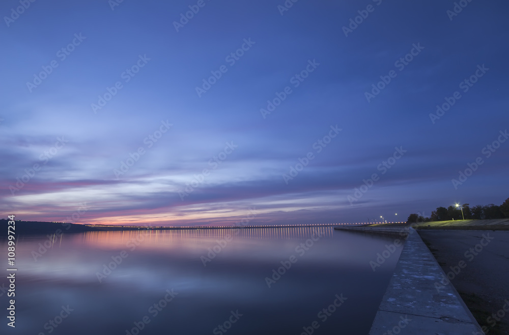 Sunset over Volga River and Presidental Bridge, located in Ulyanovsk