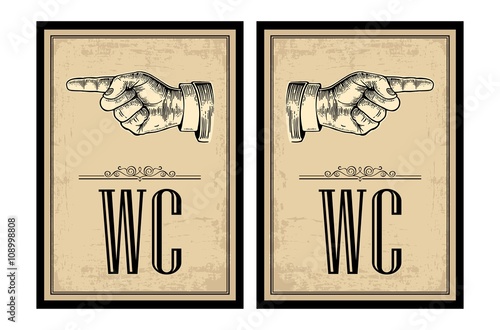 Pointing finger.  Vector vintage engraved illustration on a beige background. Hand sign for web, poster, info graphic.