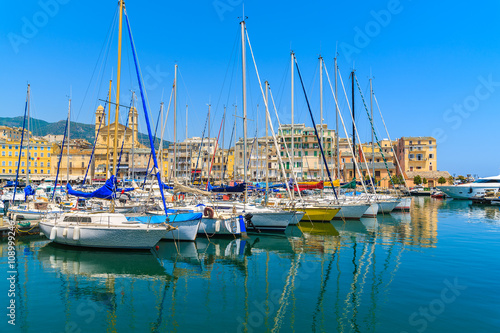 Sailing boats mooring in Bastia port on sunny summer day, Corsica island, France