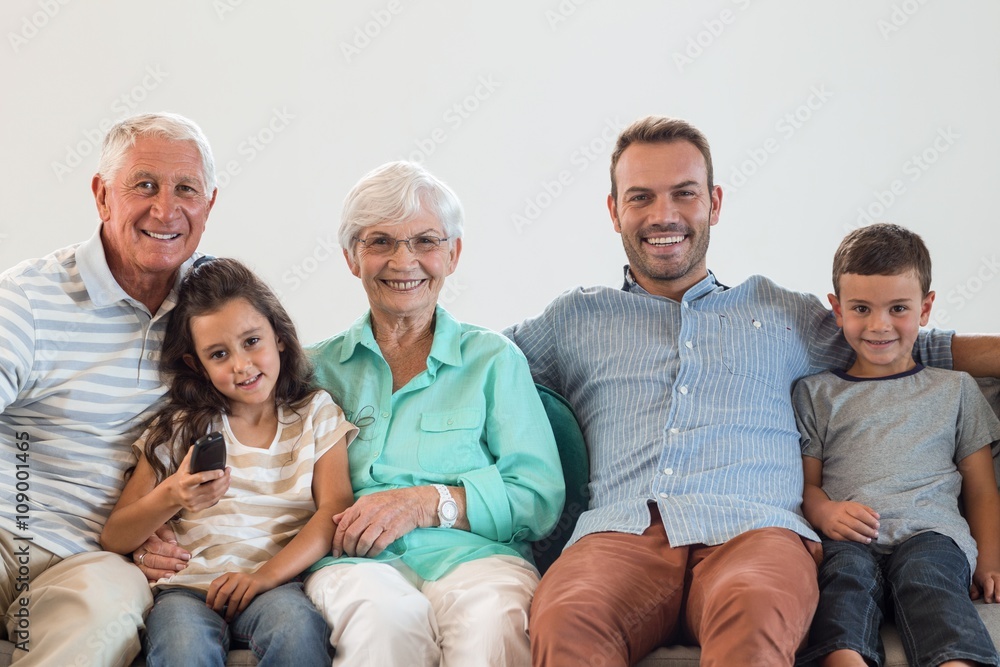 Happy family sitting on sofa Happy family sitting on sofa