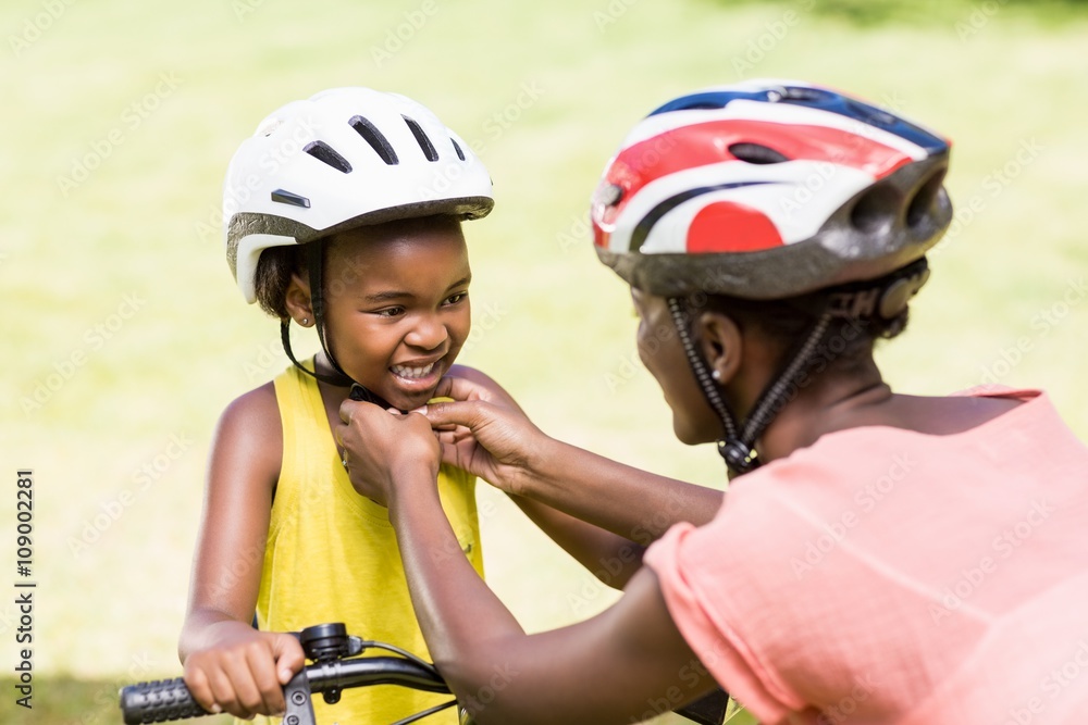 Happy family wearing a helmet Happy family wearing a helmet