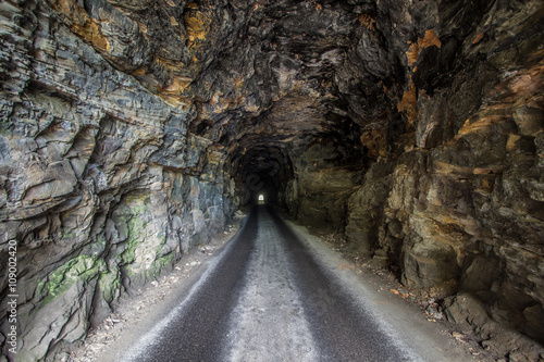 Light At The End Of The Tunnel. The 900 foot reportedly haunted Nada Tunnel in the Red River Gorge of Kentucky. Open to traffic, the harrowing one way tunnel is a thoroughfare for a two way traffic