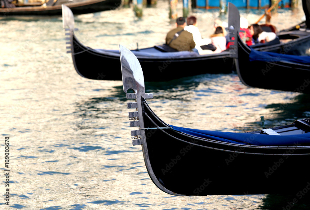 gondolas sail the Adriatic Sea near Saint Mark's square in Venic
