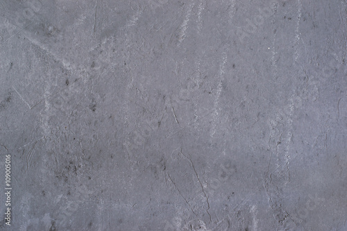 Heterogeneous concrete background with traces of spatula