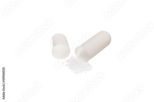 White medicine pills with drug isolated over white