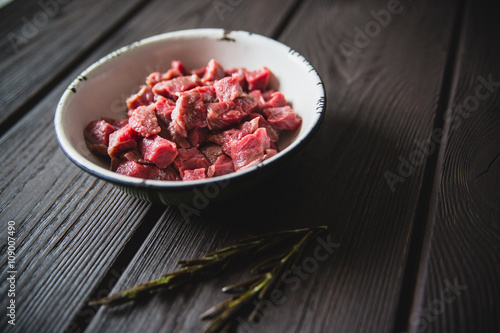 minced meat on wooden table