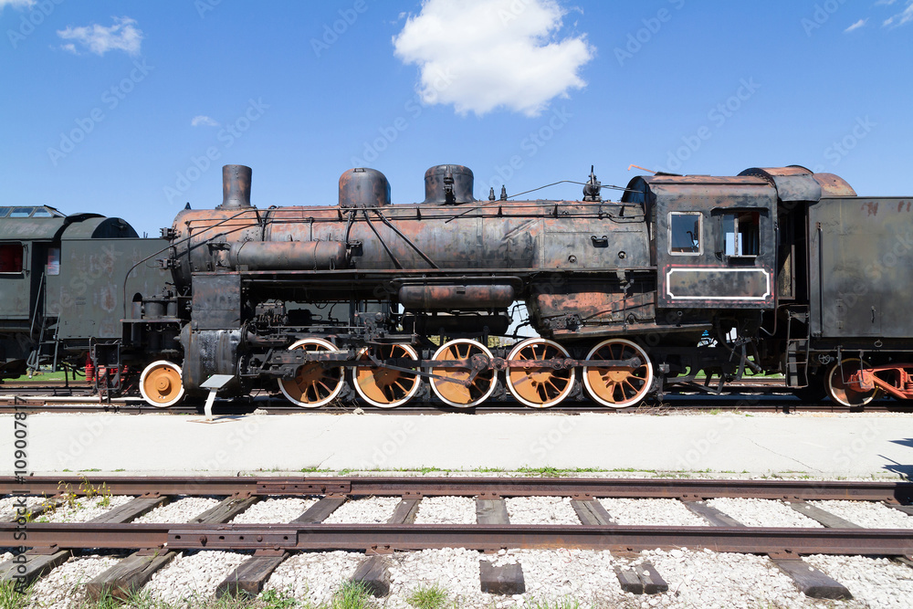 Naklejka premium Old Soviet military train locomotive .