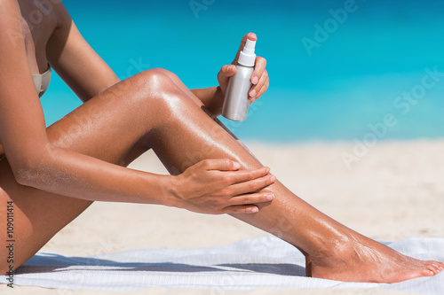 Photography Sunscreen suntan lotion in spray bottle