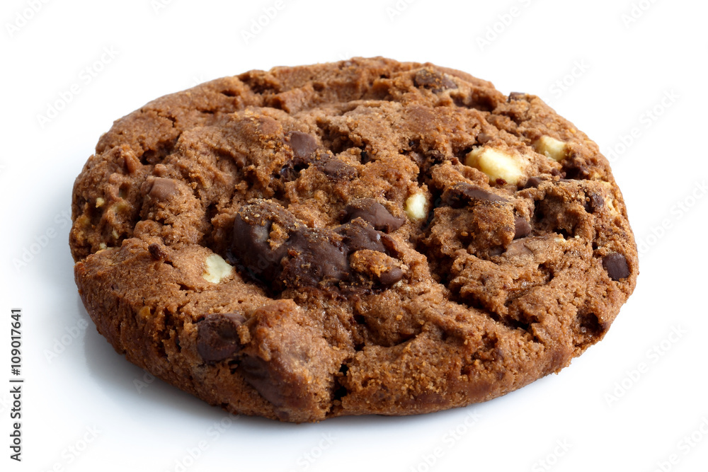 Single dark chocolate chip cookie isolated on white. Single dark chocolate chip cookie isolated on white.