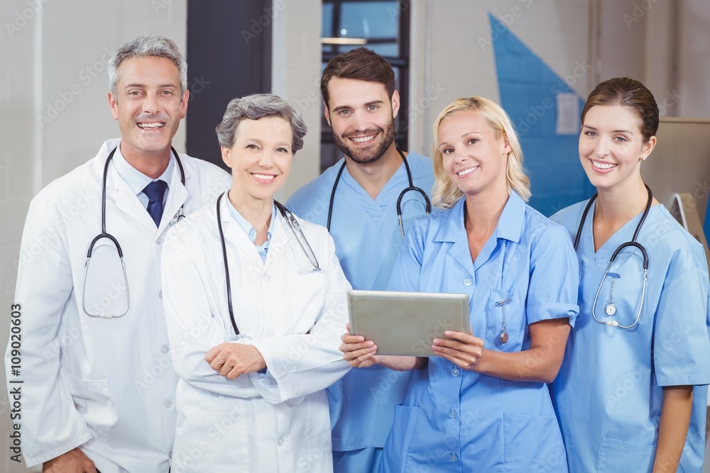 Portrait of cheerful doctor team with digital tablet Portrait of cheerful doctor team with digital tablet